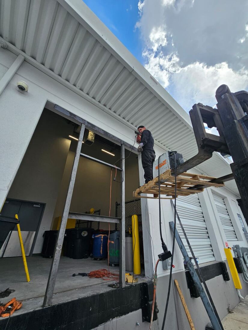 Compactor delivery and setup with forklift